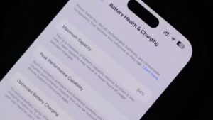 An iPhone 14 Pro showing the Battery Health menu in iOS  